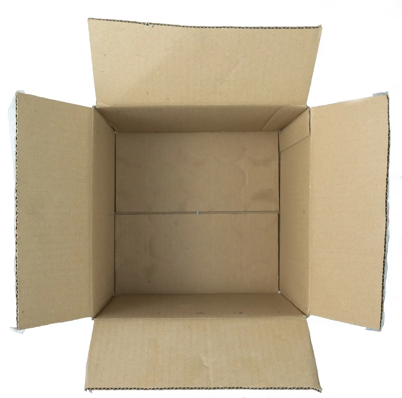 One empty open cardboard box seen from above